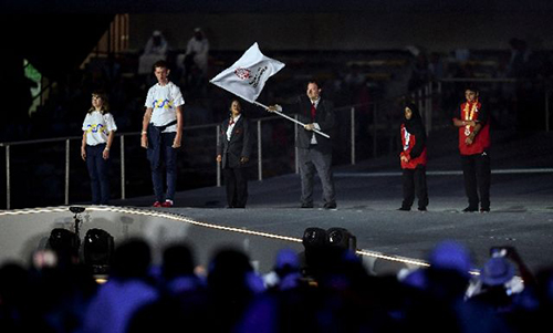 3月21日，第十五屆世界夏季特殊奧林匹克運動會在阿聯酋阿布扎比閉幕。圖為特奧會會旗交接儀式（3月21日攝）。新華社記者夏一方攝
